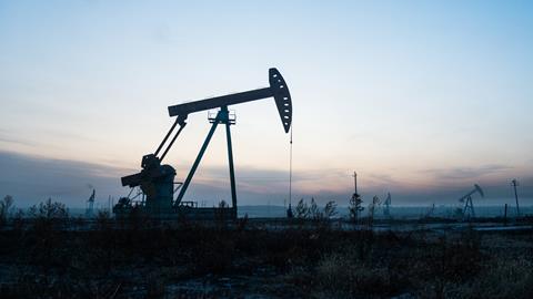 An image showing an oil pump in an oil field