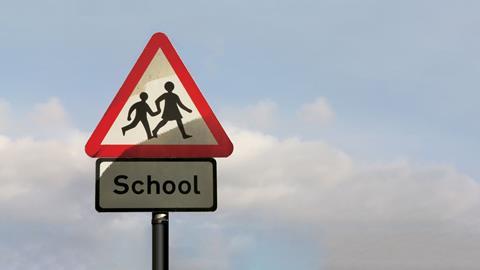An image showing a children crossing warning sign