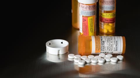 Prescription tablet bottles for oxycodone with some tablets