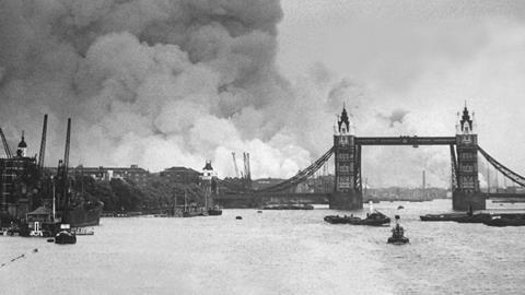 The first mass German air raid on London, during World War 2. Tower Bridge stands out against a background of smoke and fires. Sept. 7, 1940.