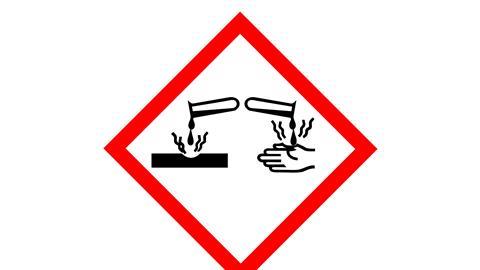 GHS05 hazard pictogram: CORROSIVE hazard warning sign