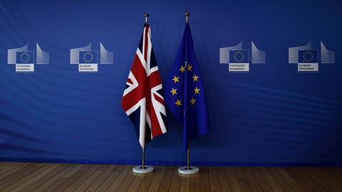 European union flag and flag of the UK at the EU Commission headquarters in Brussels, Belgium on July 19, 2018