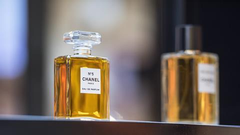 Chanel no 5 perfume bottle on a shelf 