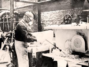 Old photo of a man making guncotton