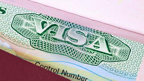 A photo of the top of a US Visa in a passoport