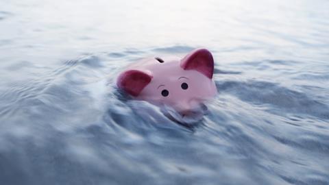 Sinking piggy bank