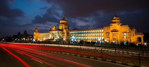 A photograph of traffic in front of Vidhana Soudha, Bangalore