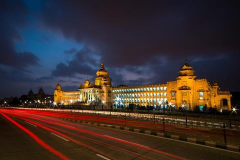 A photograph of traffic in front of Vidhana Soudha, Bangalore