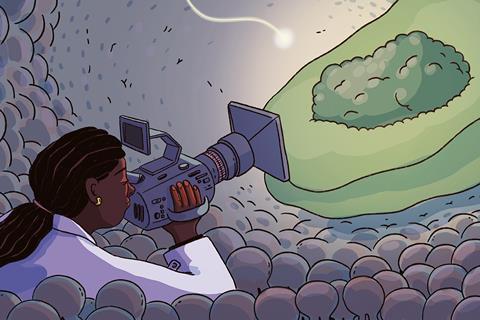 Scientist studying a protein with a camera