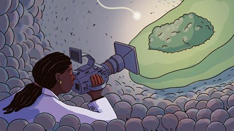 Scientist studying a protein with a camera