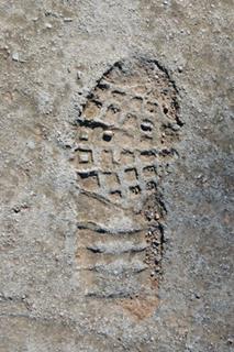 footprint in concrete