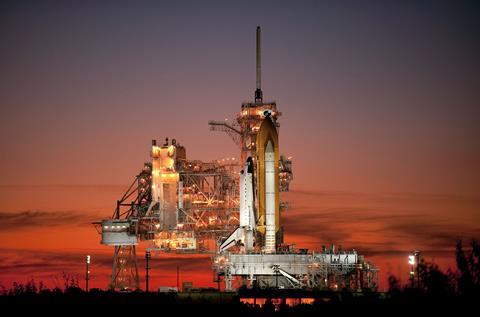 A photograph of the Atlantis shuttle prepared for launch