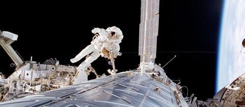 Astronaut Robert L. Curbeam, mission specialist, participates in the second of three STS-98 sessions of extravehicular activity