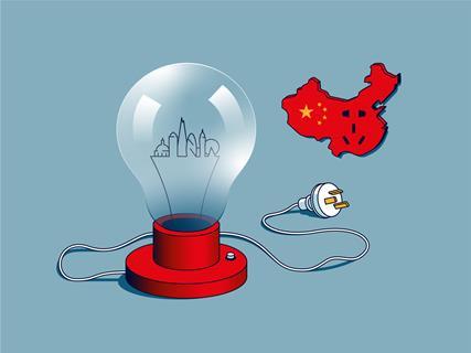A British lightbulb unplugged from a Chinese socket