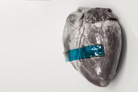 A blue strip of 'slug glue' on a heart