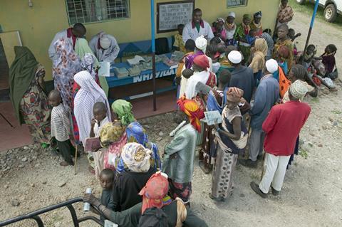 People queuing for medicines, Africa 