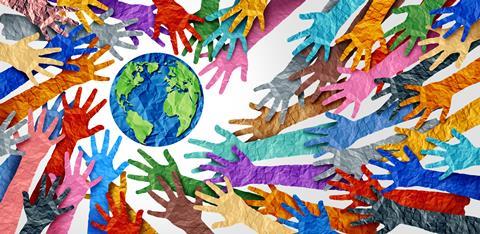 Diverse hands around the world - paper collage style illustration