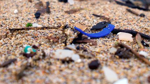 Plastic waste on a sandy beach