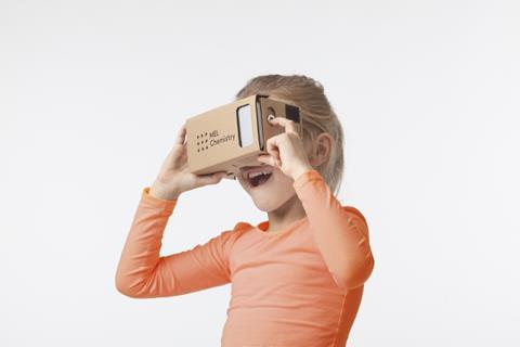 cardboard VR kit being used by girl