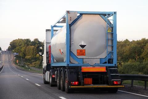 An image showing a truck carrying sulfonic acid