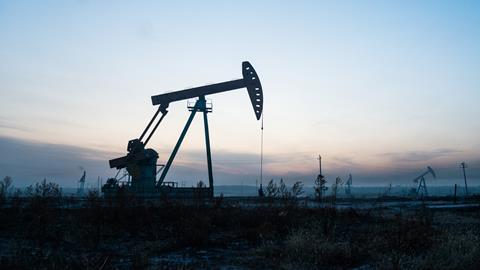 An image showing an oil pump in an oil field