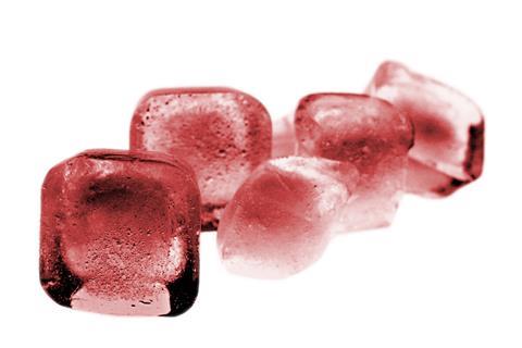 Red Colored Isolated Ice Cubes On White Background