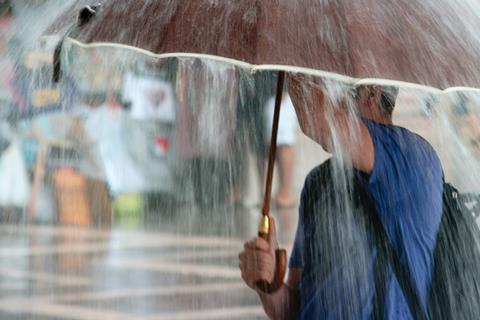 Man with umbrella in the rain