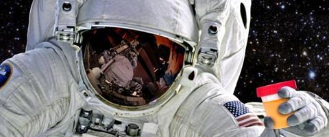 astronaut holding a urine sample