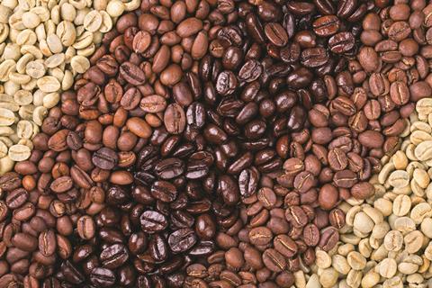 Variety of roasted and unroasted coffee beans 