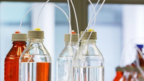 a photograph of HPLC solvent bottles