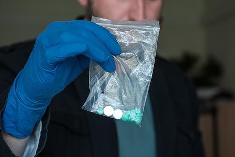 An image showing drugs in an evidence bag