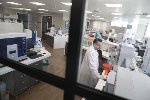 An image showing a researcher in the lab