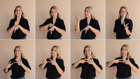 Woman demonstrating sign language in chemistry