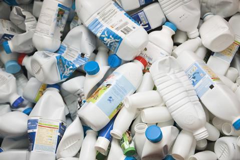 An image showing empty milk bottles