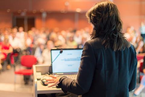 Woman lecturing at conference