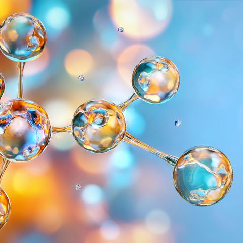 3D illustration of a molecule made up of clear spheres on an out of focus blue and yellow background