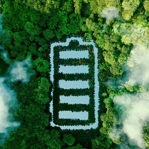 A battery logo imprinted on a rainforest, viewed from above
