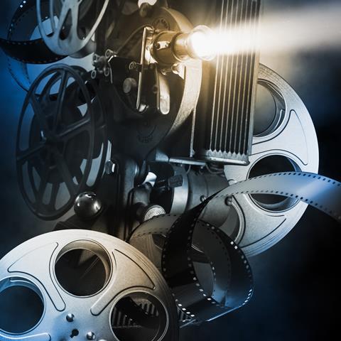 Cover image for Onscreen Chemistry RSC book showing films reels and projector on a dark background