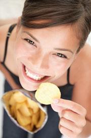 female-eating-crisps_shutterstock_180