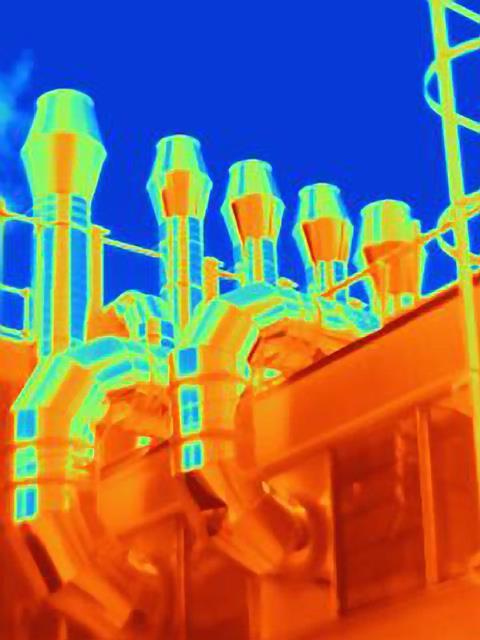 A thermogram showing hot industrial smoke stacks