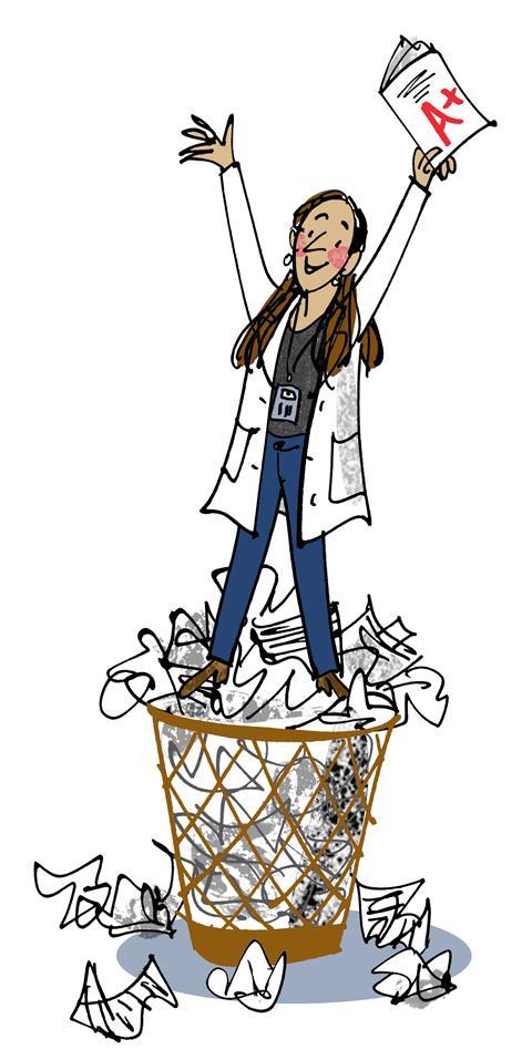 Woman on top of bin with crumpled paper