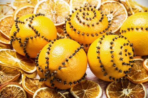 Oranges studded with cloves as Christmas decorations