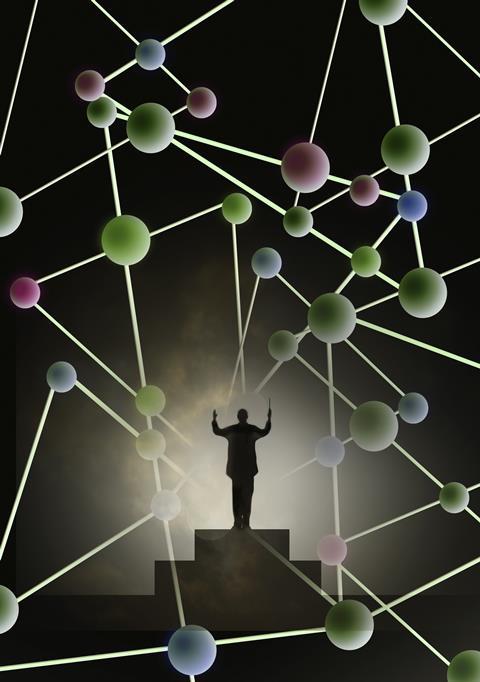 An illustration showing a man directing molecules