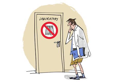 An image showing a researcher dressed in sandals and wearing shorts, pondering at a sign on a laboratory door which shows that shorts may not be worn