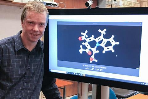 An image showing Matt Lightfoot next to CCDC's 1 millionth structure