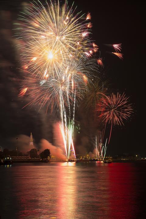 A photograph of a colourful fireworks display in Thailand