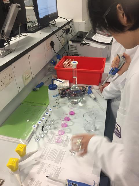 An image showing a student working with a mixture of sulphanilamide, orthophosphoric acid, and NEDD