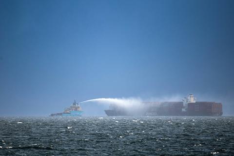 An image showing a ship fire being extinguished 