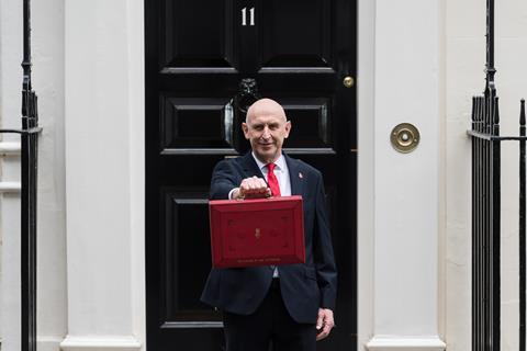 Chancellor holding red budget box
