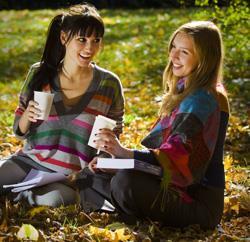 Girls-drinking-coffee-outside_shutterstock_250